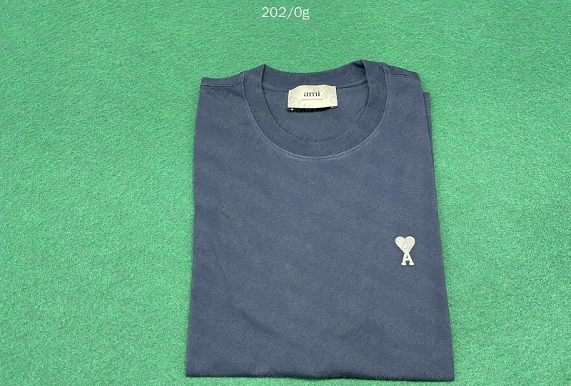 2 AMI Shirts
