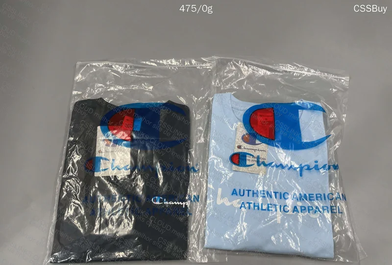 2 Champion Shirts, with Blue Size Measurements