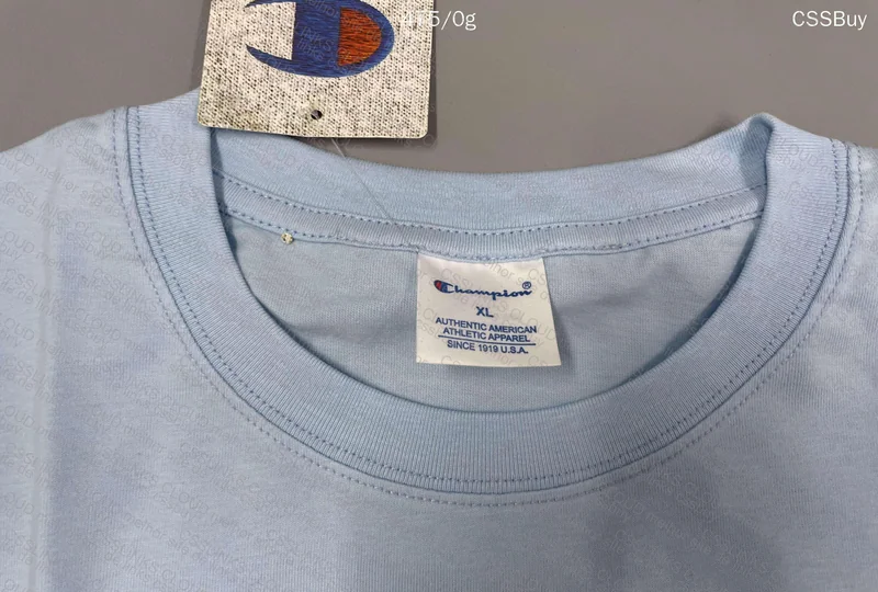 2 Champion Shirts, with Blue Size Measurements 4