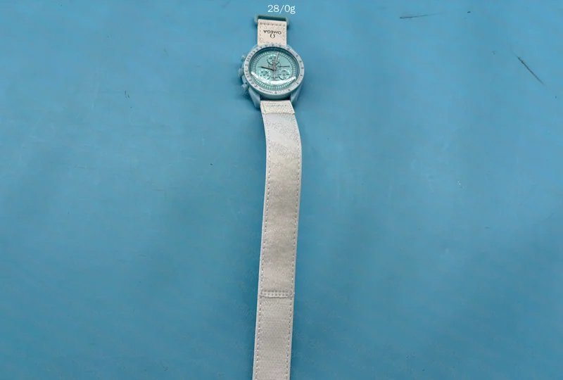 3 Moonswatch Watches and a Pandora Ring 3