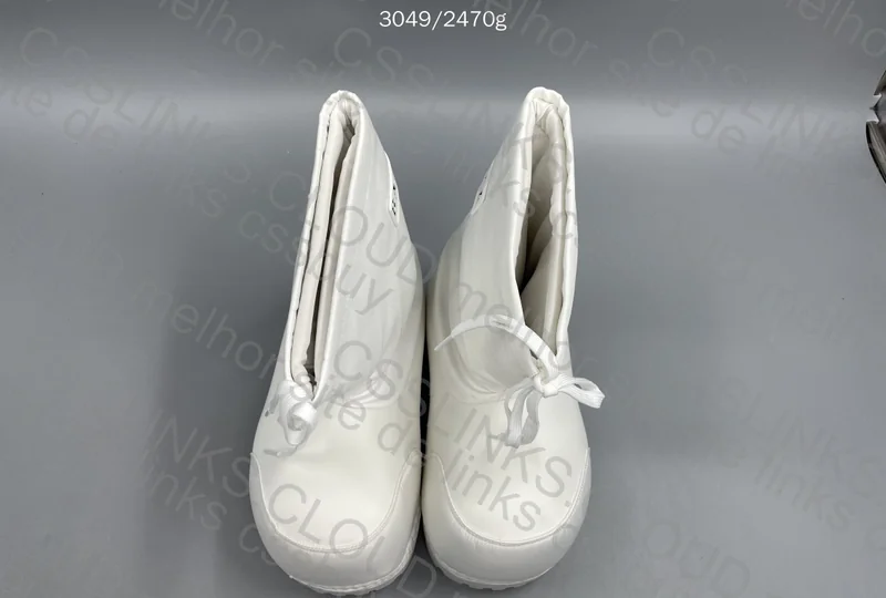 BALENCIAGA → [ ALASKA WHITE ASS BOOTS ]