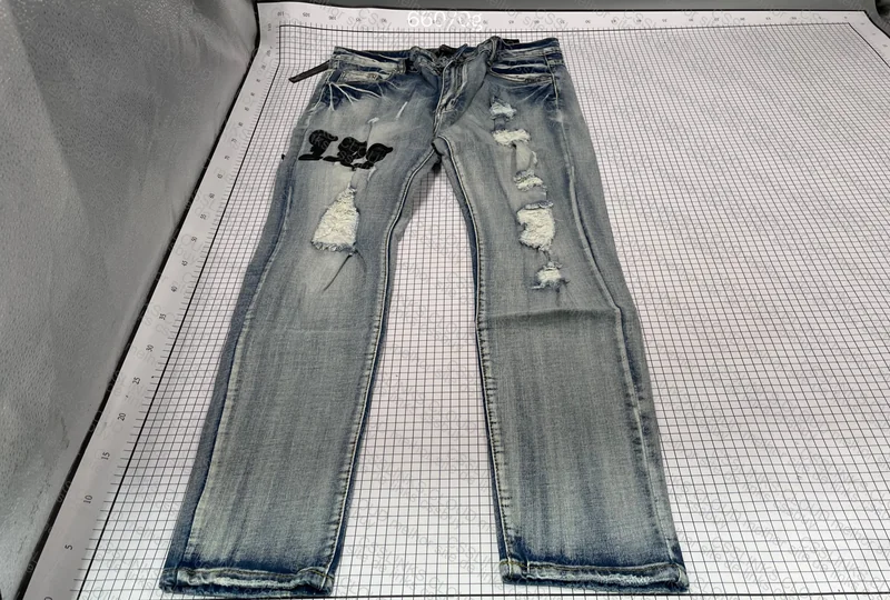 Amiri 110¥ Pants 3