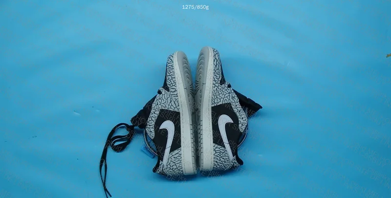 Jordan 1 low black cement blind box 2