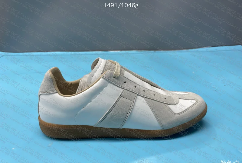 MAISON MARGIELA GATS WWTOP 3