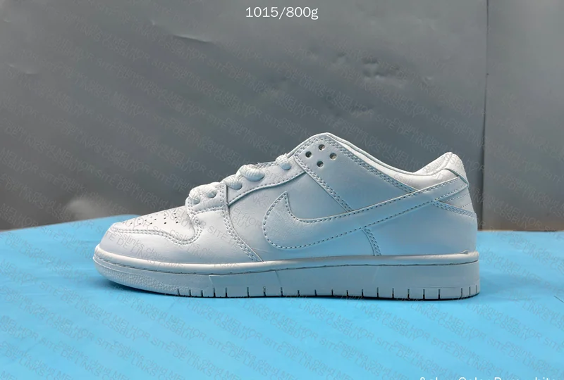 nike dunk low triple white 4