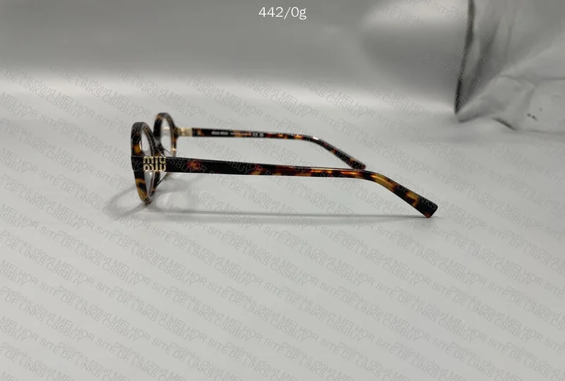 Miu Miu Regard Sunglasses