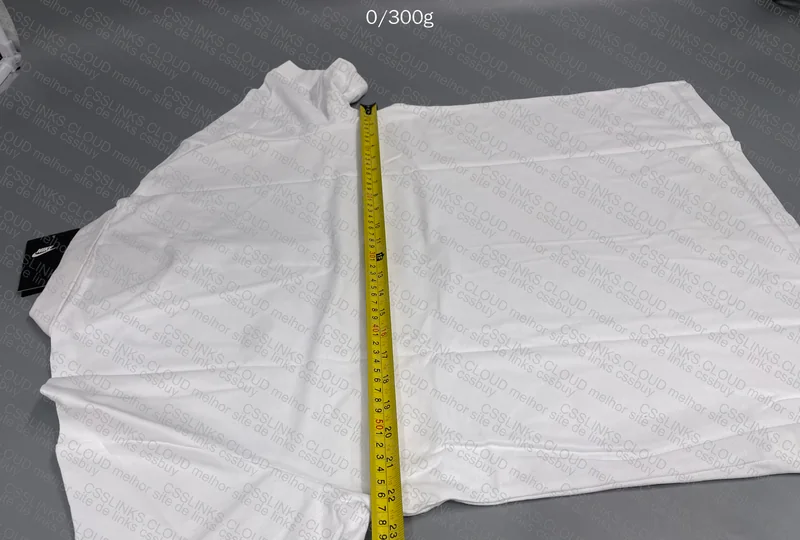 White Nike Polo with Measurements 4