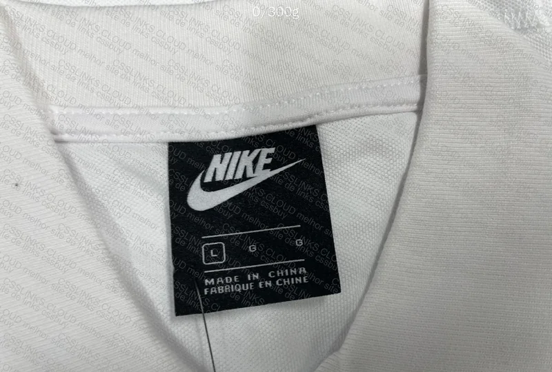 White Nike Polo with Measurements 5