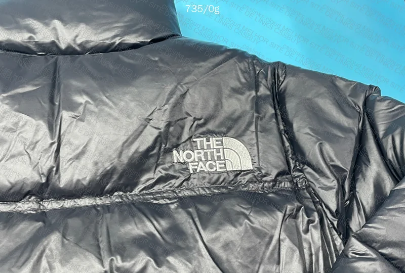 Female Black The North Face Puffer 7