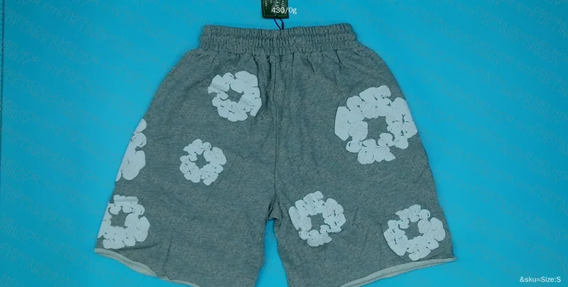 shorts denim tears