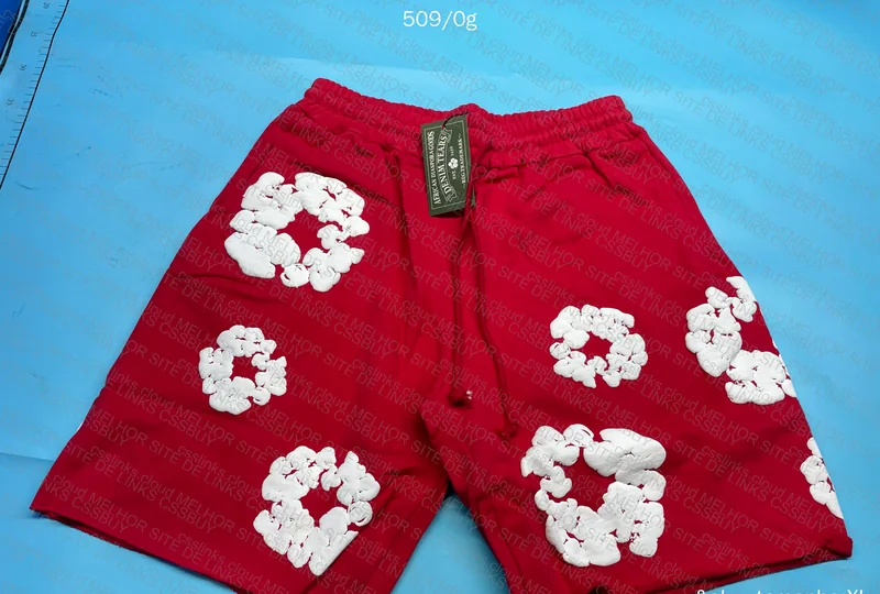 SHORTS DENIM TEARS 2