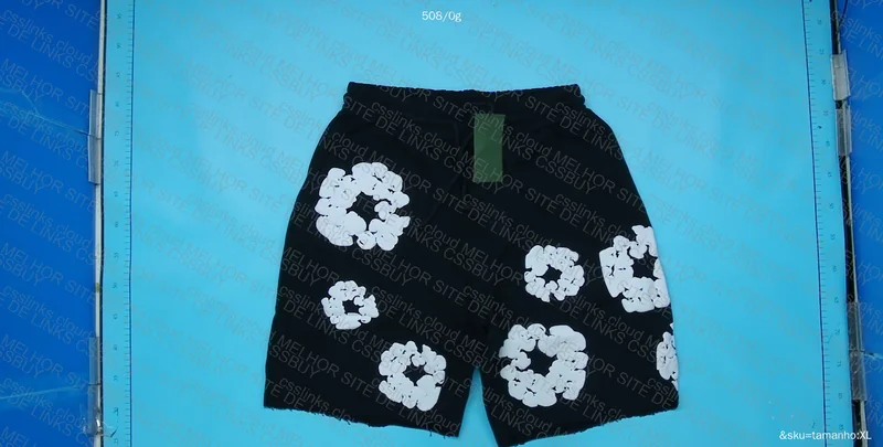 SHORTS DENIM TEARS 3