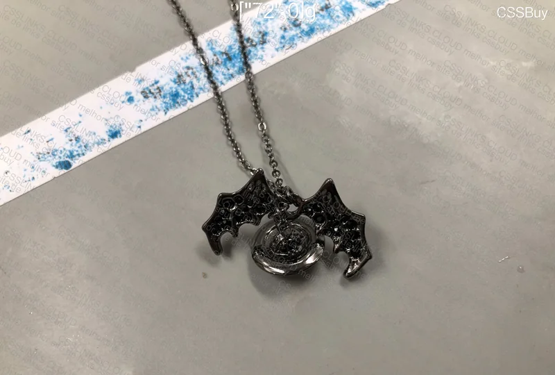 VV Westwood Bat wings & Saturn necklace 2
