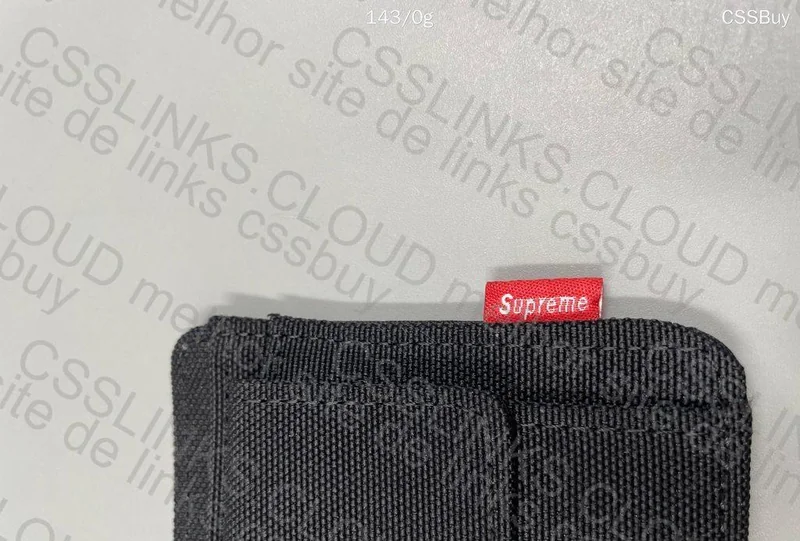 Yeezy Slide and Supreme Wallet 6